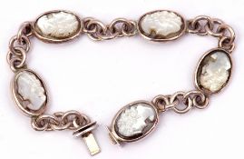 White metal and mother of pearl bracelet featuring 5 oval shaped carved cameo portraits of young