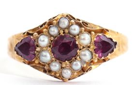 Antique 15ct gold, purple stone and seed pearl ring, the circular shaped centre stone within a