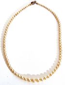 Cultured pearl necklace, a single row of graduated pearls, 2mm to 6mm diam to a metal clasp