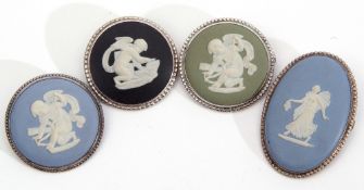 Mixed Lot: four Wedgwood brooches, three circular examples, jasper, green, black, each depicting