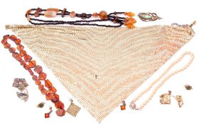 Mixed Lot: modern amber to include a bead necklace, bracelet and earrings, brooches, simulated