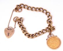 9ct gold curb link bracelet with heart padlock and safety chain fitting, suspending an Edward VII