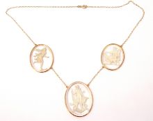 9ct gold glass intaglio necklace featuring 3 graduated glass intaglios depicting classical figures