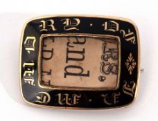 Victorian mourning brooch of rectangular form, the surround a black translucent enamel inlaid with