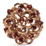 9ct gold garnet set dress ring, bombe style, comprising a series of 16 round faceted almandine