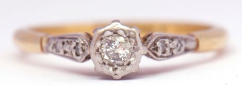 Single stone diamond ring, a small brilliant cut diamond in an illusion setting raised between