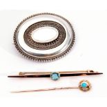 15c stamped tie pin, the finial set with a cabochon turquoise, a 9ct stamped bar brooch with central