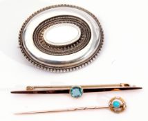 15c stamped tie pin, the finial set with a cabochon turquoise, a 9ct stamped bar brooch with central