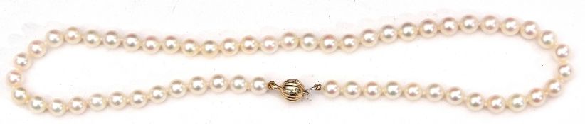 Cultured pearl necklace, a single row of uniform beads, 6mm diam, to a 375 stamped ball clasp,