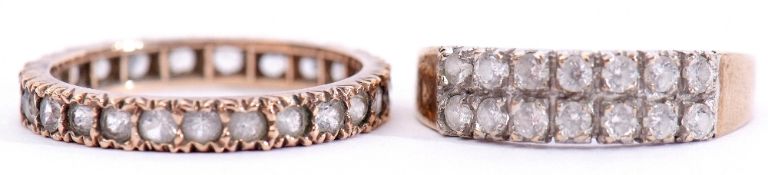 Mixed Lot: a yellow metal full eternity ring comprising 25 round faceted white spinels, tested for