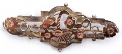 George V silver and gold set brooch, a pierced design, the centre engraved and chased with a