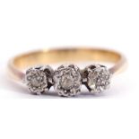 Three-stone diamond ring featuring 3 small old cut diamonds, individually claw set in illusion
