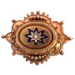 Victorian gold brooch, the raised oval centre with small seed pearl in a star engraved setting,