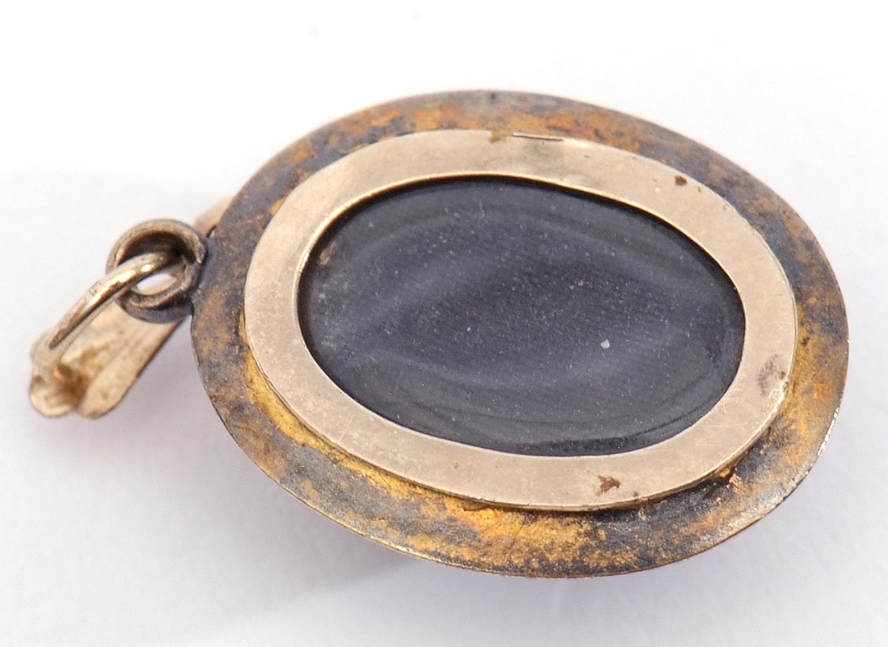 Antique small gilt metal oval locket, the centre applied with 4 collet set small turquoises, the - Image 3 of 4