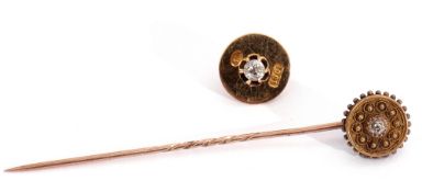 Victorian cased stick pin, the Etruscan finial centring a diamond, together with an 18ct stamped