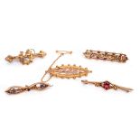 Mixed Lot: five late 19th/early 20th century 9ct gold brooches, a horseshoe, a two-tone coloured