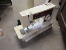 CASED ELECTRIC SINGER SEWING MACHINE