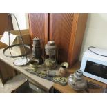 TWO VARIOUS PARAFFIN LAMPS AND AN OIL LAMP, HORSE BRASSES, TRIVET ETC