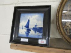 FRAMED DELFT BLUE AND WHITE TILE DEPICTING A WINDMILL AND BOATS ON A RIVER