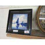 FRAMED DELFT BLUE AND WHITE TILE DEPICTING A WINDMILL AND BOATS ON A RIVER