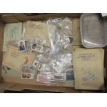 BOX CONTAINING A COLLECTION OF CIGARETTE CARDS SORTED INTO SETS/PART SETS AND ALSO MOUNTED IN ALBUMS