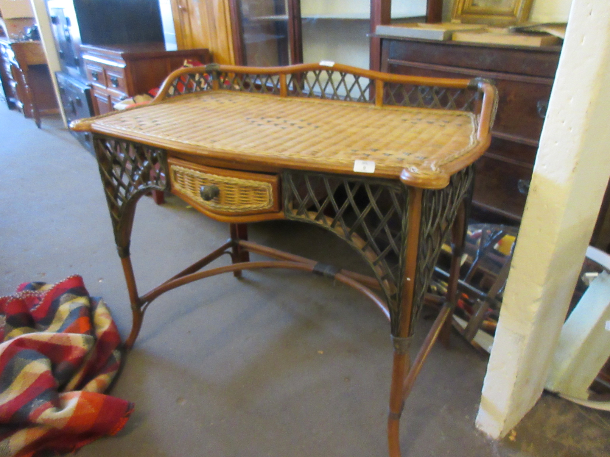 CANE DRESSING TABLE WITH RAISED GALLERY TO REAR AND DRAWER BENEATH, WIDTH 102CM