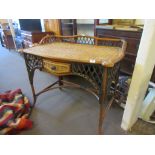 CANE DRESSING TABLE WITH RAISED GALLERY TO REAR AND DRAWER BENEATH, WIDTH 102CM