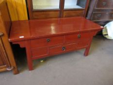 MODERN CHINESE STYLE HARDWOOD TABLE WITH THREE DRAWERS, PAINTED IN RED, 122CM WIDE