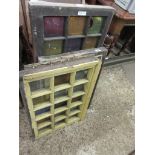 THREE VINTAGE WOODEN WINDOW FRAMES INSET WITH COLOURED GLASS