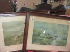 PAIR OF FRAMED PRINTS OF HIGHLAND CATTLE ENTITLED “SUNRISE ON LOCH KATRINE” AND “SUNSET ON THE