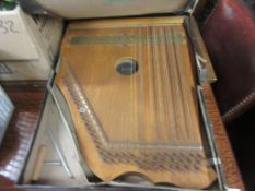 BOXED PIANOCORD INSTRUMENT