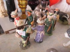 EIGHT BESWICK FIGURES INCLUDING GENTLEMAN PIG, FISHERMAN, OTTER, MRS RABBIT BAKING ETC