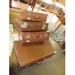 FOUR VINTAGE SUITCASES