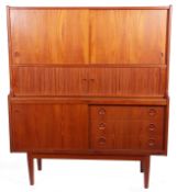 Mid-20th century Danish teak side unit with sliding cupboard drawers and inset circular handles with