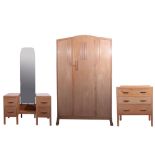 Trevor Page & Co (Norwich) lined oak three piece bedroom suite comprises a wardrobe with single door