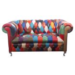 21st century designer Chesterfield arch back sofa, upholstered in multi-coloured leather harlequin