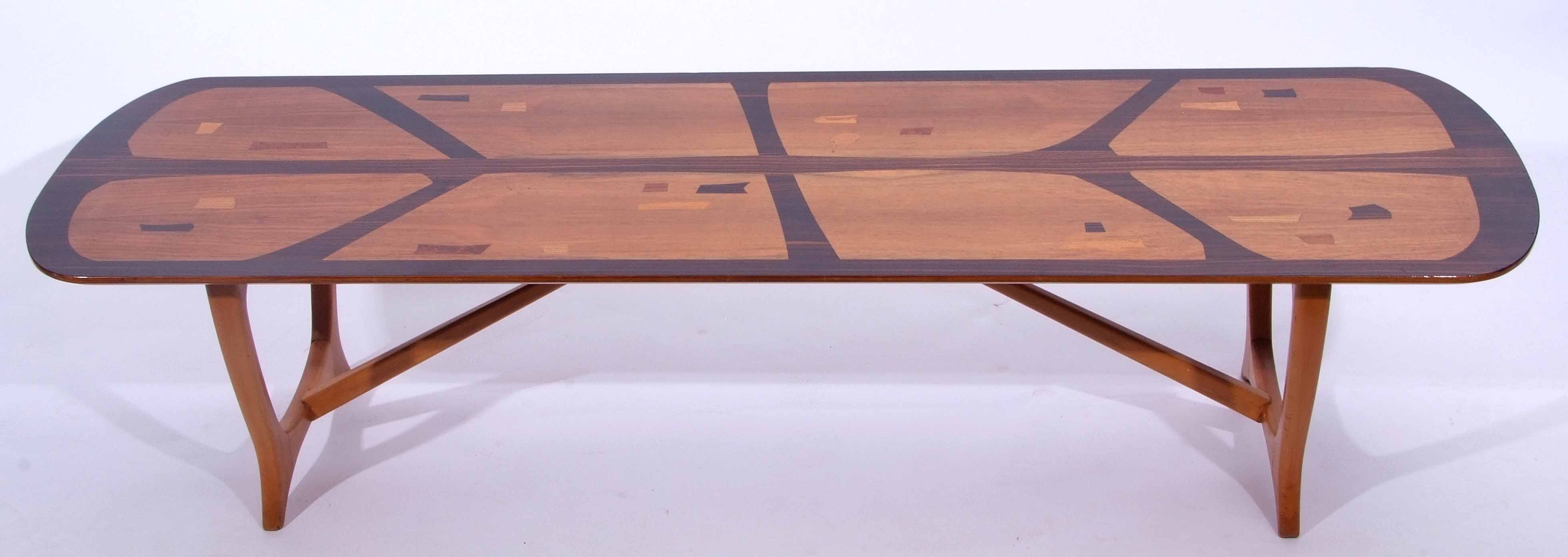 Mid-20th century Avalon made for Heals coffee table constructed from rosewood and further exotic