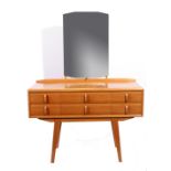 Mid-20th century Heals dressing table with six drawers and mirrored back supported by splayed