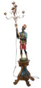 Mid-century painted plaster "blackamoor" standard lamp in the form of a figure standing and