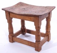 20th century Robert Thompson Mouseman oak and burr wood stool, the dish top raised on octagonal legs