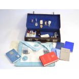 Masonic briefcase containing jewels, apron and handbooks, instructions and manuals
