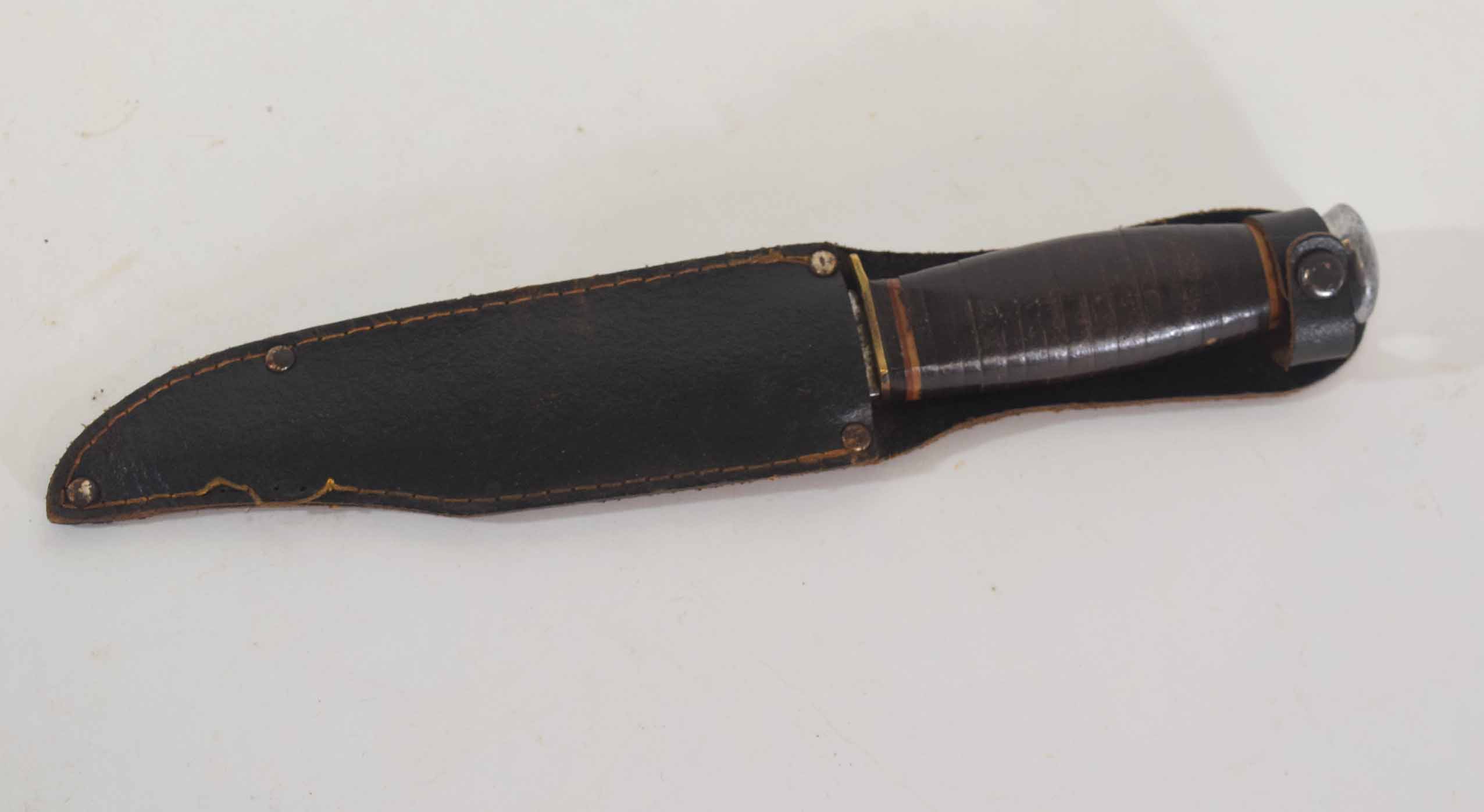 Bowie knife by Solar, blade inscribed "Original Bowie Knife", the steel blade above guard and