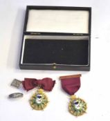 Pair of cased jewels inscribed Beatrus Dare Quam Accipere, both silver gilt