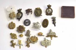 Quantity of British 19th and 20th century cap badges to include Victorian Glengarry Earl of Ulster