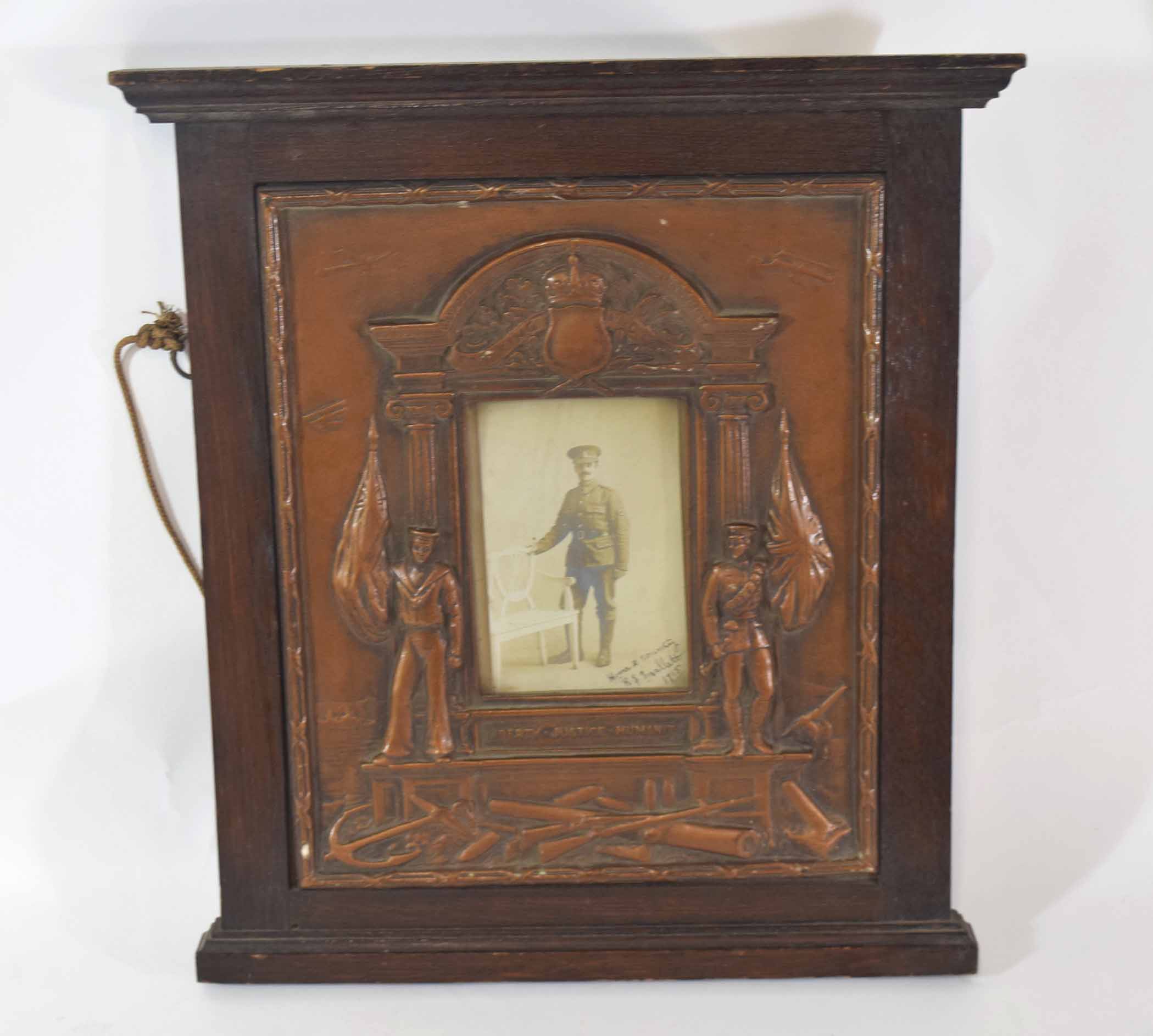 WWI Remembrance photo in frame flanked by sailor and soldier of Pte Robert Samuel Mallett, Royal