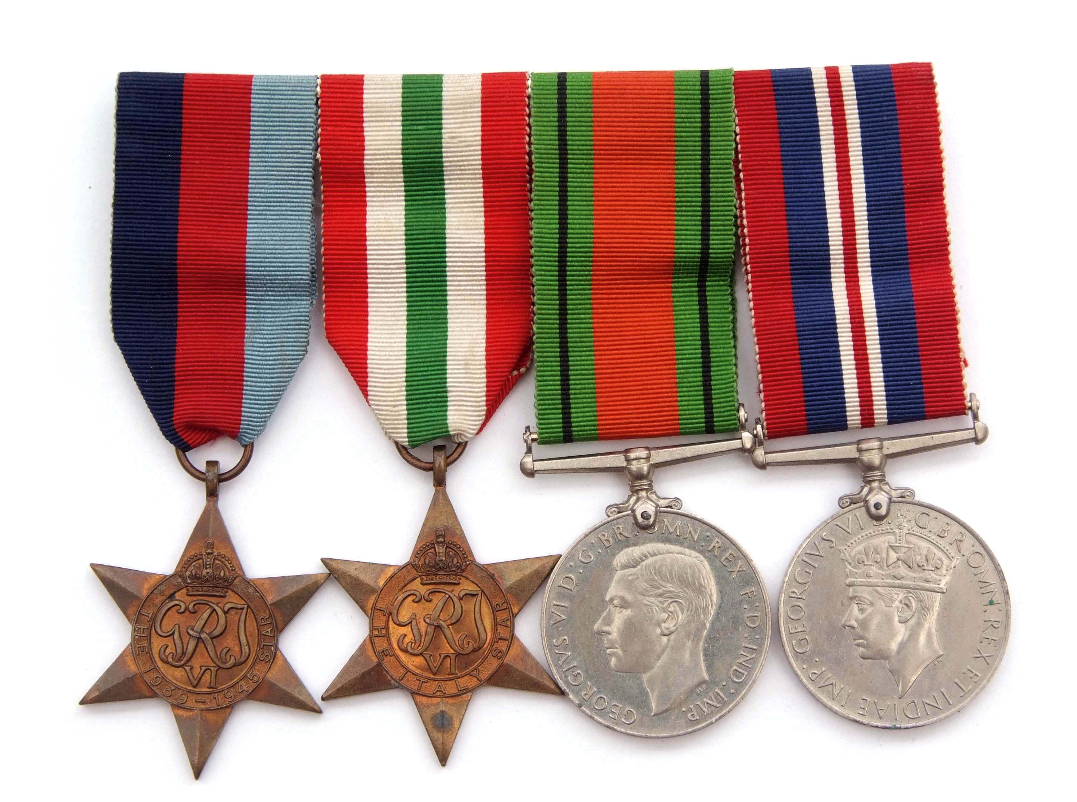 WWII group of four comprising 39-45 Star and Italy Star, together with Defence Medal and War Medals,