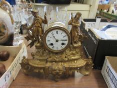GILT MANTEL CLOCK WITH TWO FIGURES TO TOP