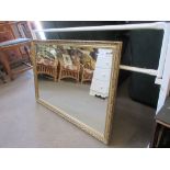 MODERN GILT BEVELLED WALL MIRROR, 83CM WIDE