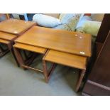 GROUP OF THREE G-PLAN STYLE NEST OF TABLES, LARGEST 82CM WIDE