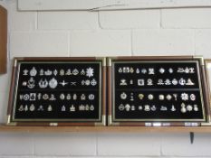 TWO WOODEN AND BRASS DISPLAY FRAMES “THE MILITARY BADGE COLLECTION”, 69CM WIDE EACH